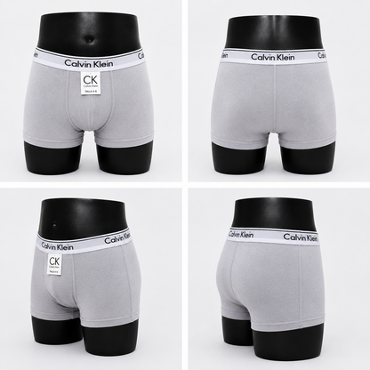 3 Boxer niño CK color surtido + 3 Pares de medias